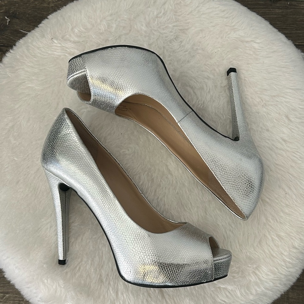 Never Worn Guess Silver peep toe heels. Size: 6.5